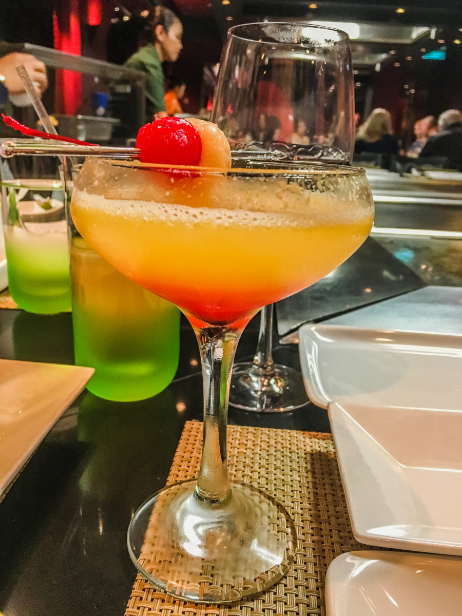 Whether you prefer a beer at the bar or a drink by the pool, cruise drinks packages can be a big question mark. But should you spring for one? This post will help you decide - and even includes a table with numbers and pricing!  #cruise #cruisetips #cruisevacation #drinks #drinkspackage